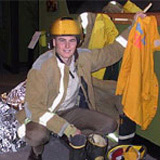 WFI Fellow Luke Balacombe from Australia in yellow hardhat and safety jacket