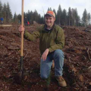 Man posing with a shovel