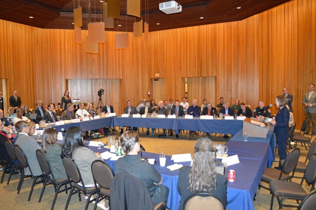 The-World-Forestry-Center-was-honored-to-host-several-meetings-of-the-Oregon-Governors-Council-on-Wildfire-Response-scaled Large group of people listen to a lecture speaker and watch a presentation