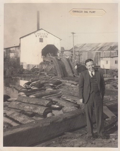 Ben B. Cheney stands in front of a Cheney Lumber Co. location in Chehalis, WA