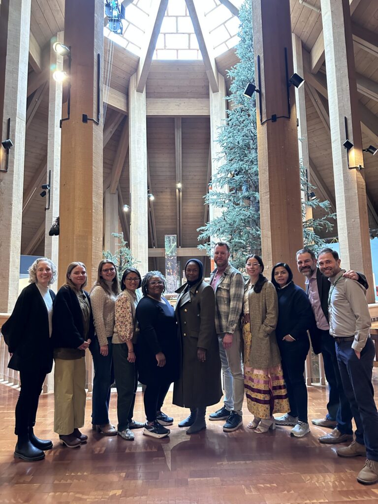 A speaker in a conference room.