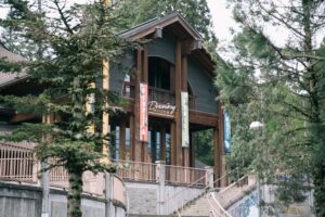 Building museum entrance with trees.
