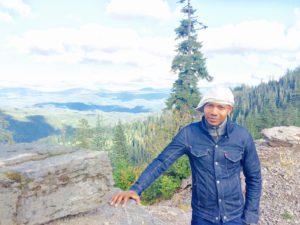 Paul D. Miller in the forest