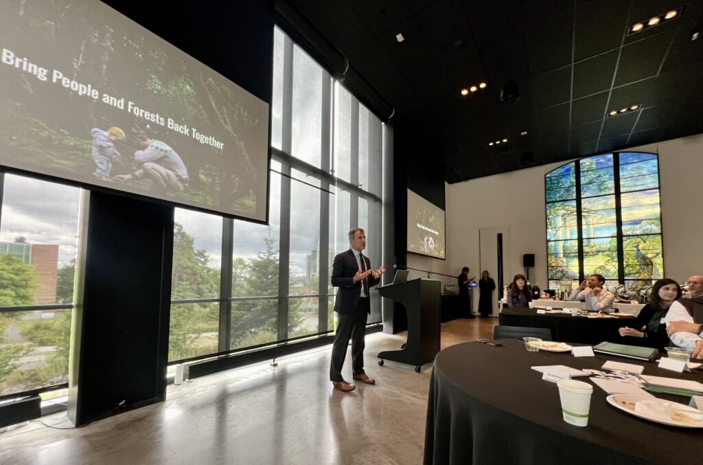 A speaker in a conference room.