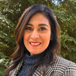 Maria A. Reyes smiling